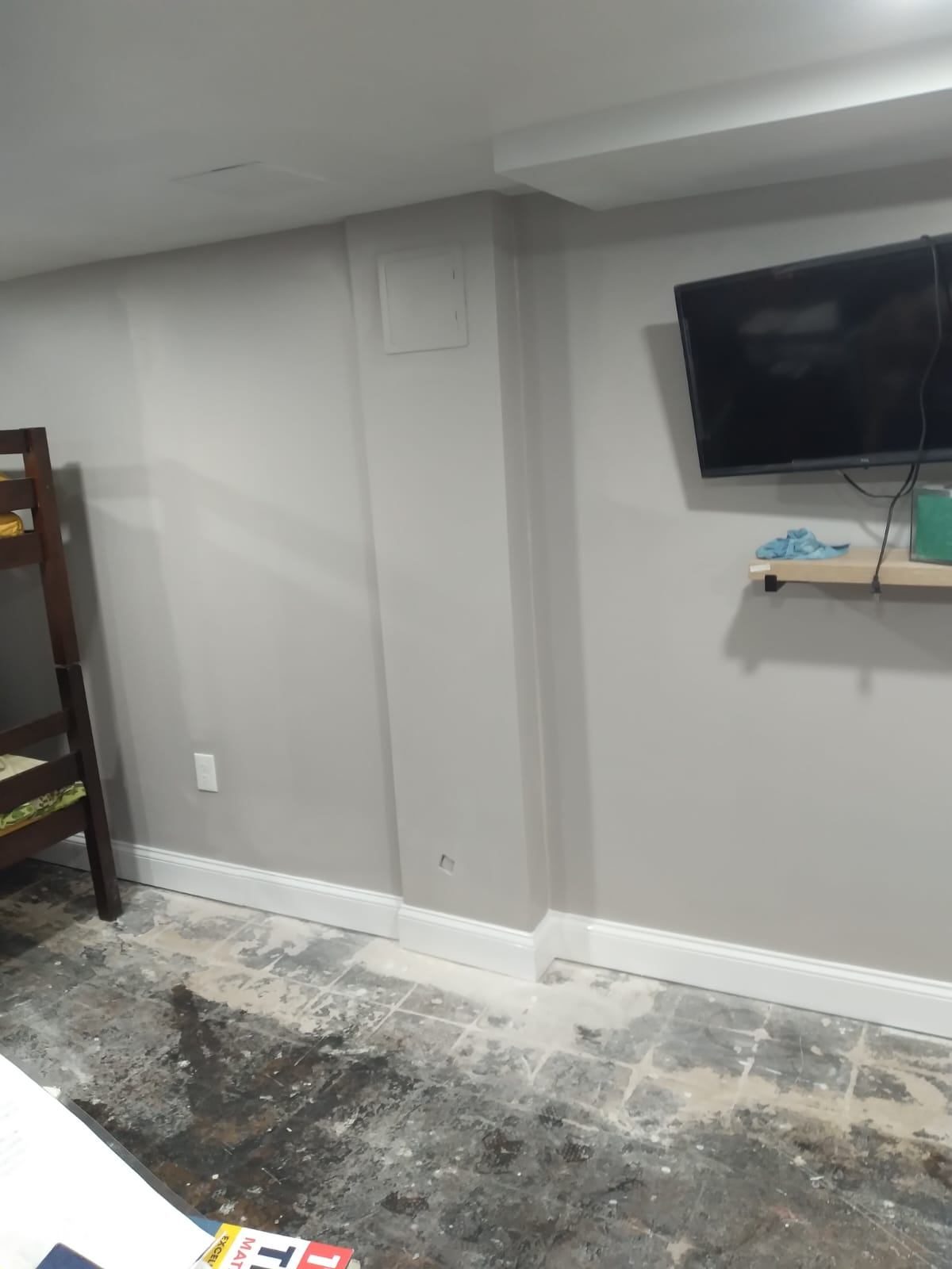 Finished basement with drywall and recessed lighting