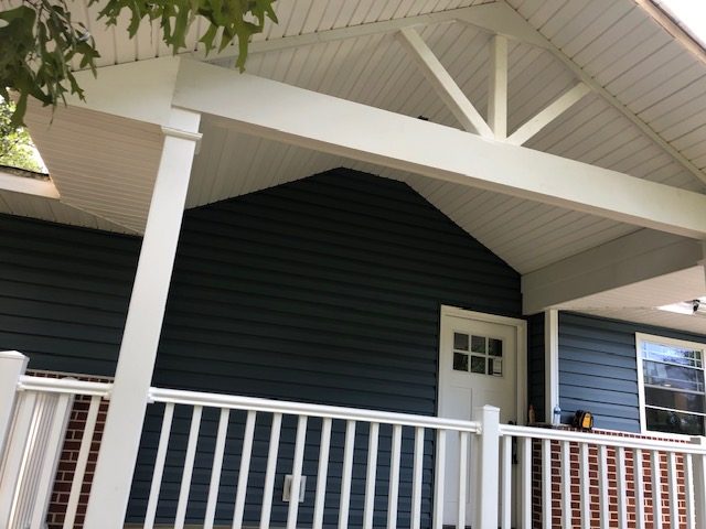 Porch roof and siding repair on a Maryland home